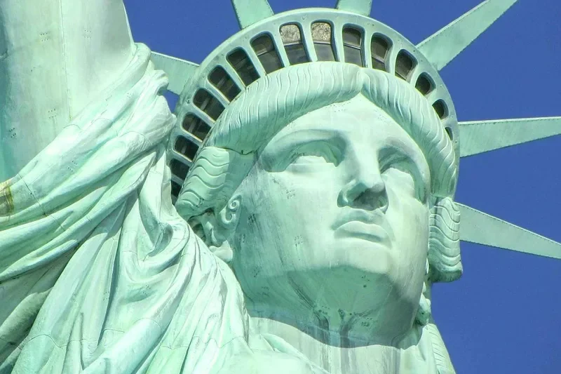 The Statue of Liberty seen from the harbor ferry, a landmark stop among museums in New York, Liberty Island, New York